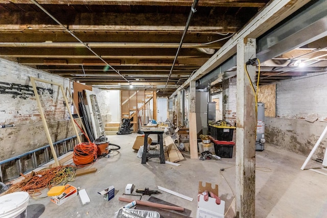 basement featuring gas water heater