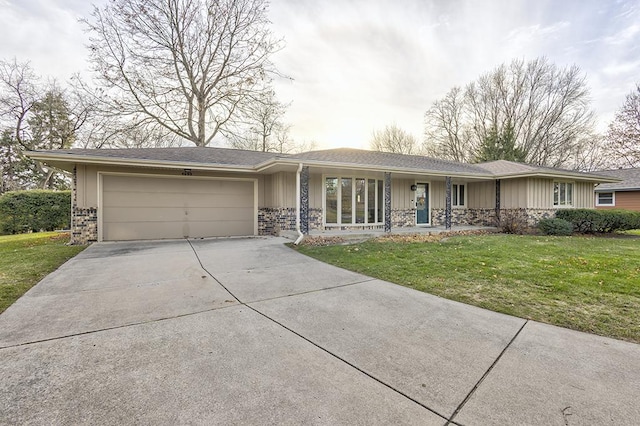 single story home featuring a front yard and a garage