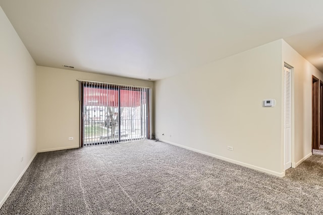 empty room featuring carpet flooring