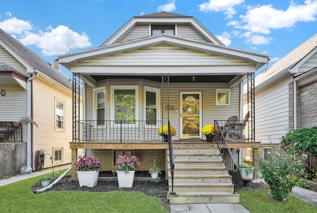 view of front of property featuring covered porch