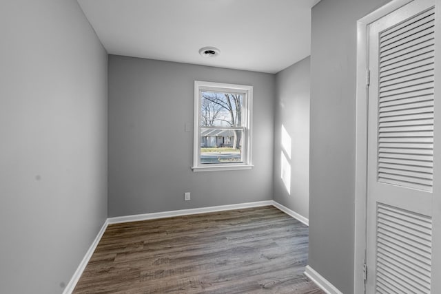 unfurnished room with light hardwood / wood-style floors