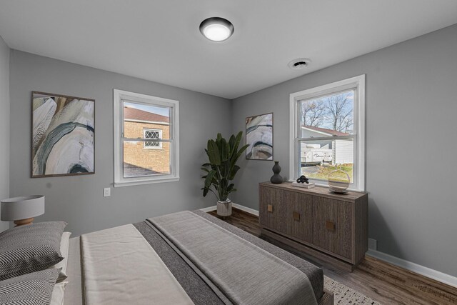 unfurnished bedroom featuring wood-type flooring