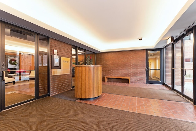 interior space with a brick fireplace