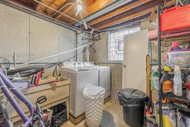 washroom with washing machine and clothes dryer