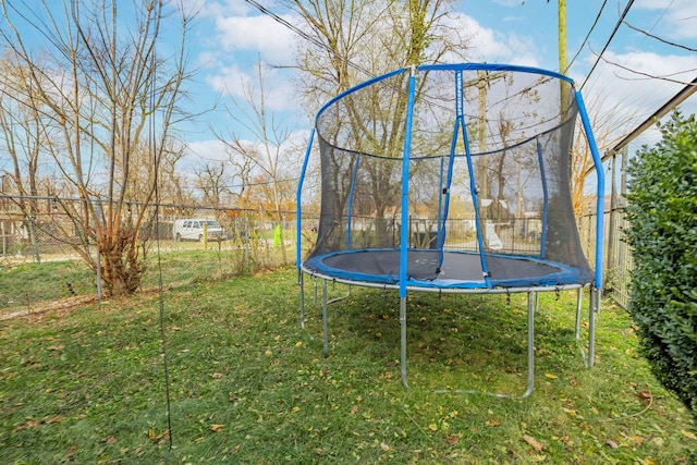 view of yard with a trampoline