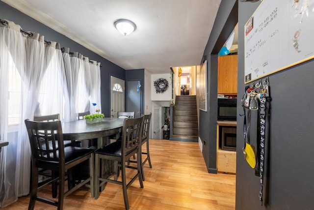 dining room featuring light wood-type flooring