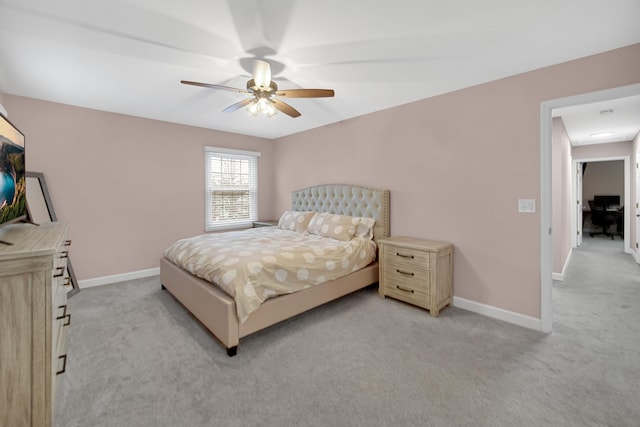 bedroom with light colored carpet and ceiling fan