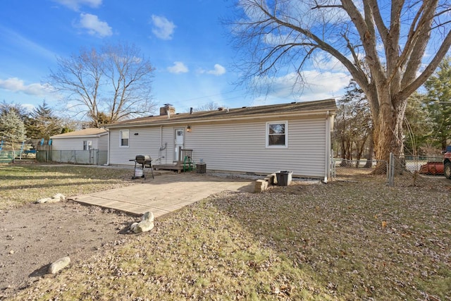 rear view of property with a patio area