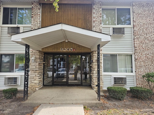 property entrance featuring french doors