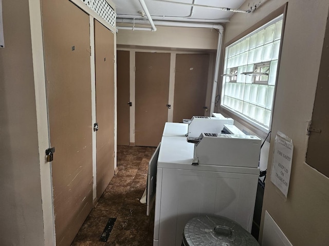 washroom featuring independent washer and dryer