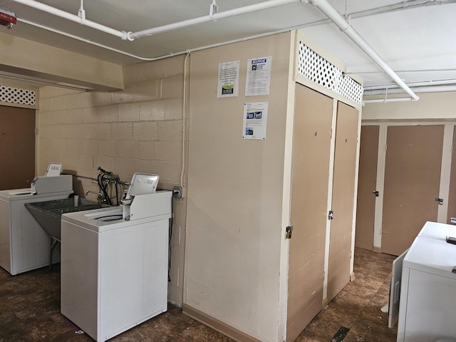 laundry room with separate washer and dryer