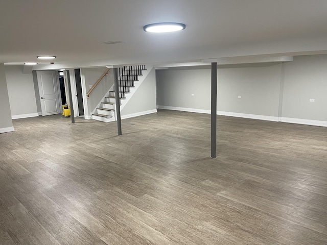 basement featuring dark wood-type flooring