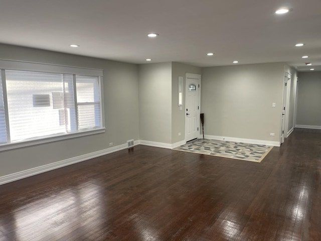 interior space with dark hardwood / wood-style floors