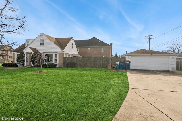 view of front of home with a front lawn and a garage