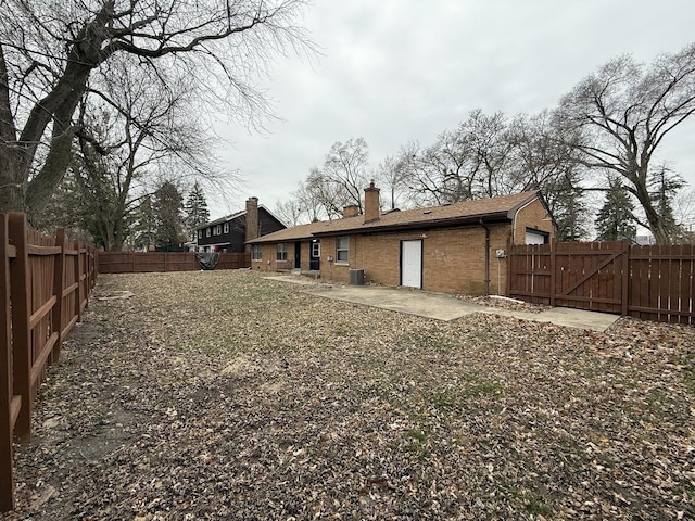 rear view of house featuring a patio area