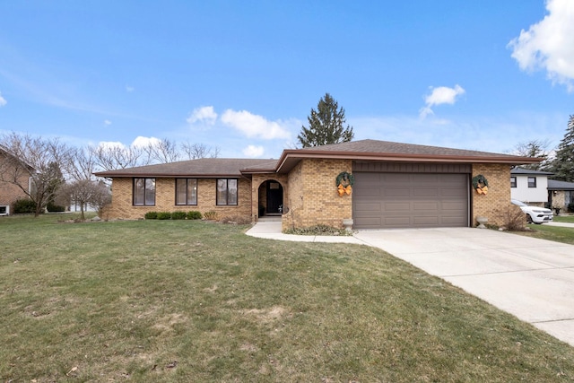 ranch-style home featuring a garage and a front yard