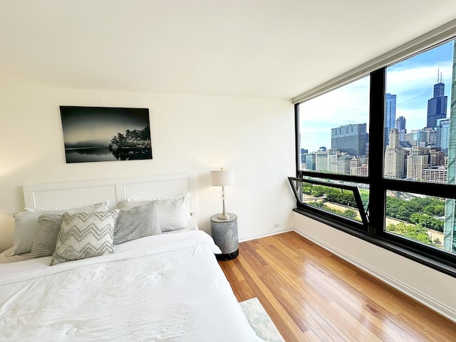 bedroom featuring hardwood / wood-style flooring