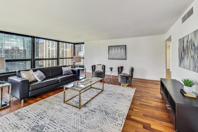 living room with dark hardwood / wood-style flooring