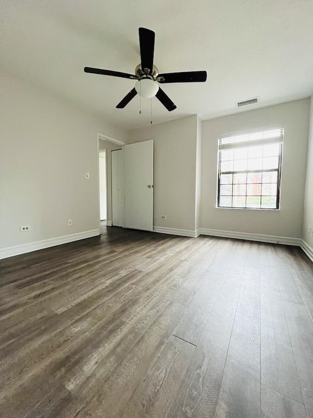 unfurnished bedroom with hardwood / wood-style floors and ceiling fan