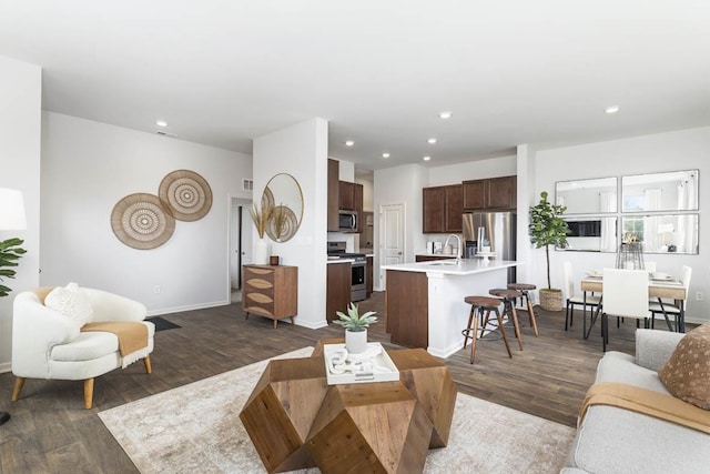 living room featuring dark hardwood / wood-style flooring