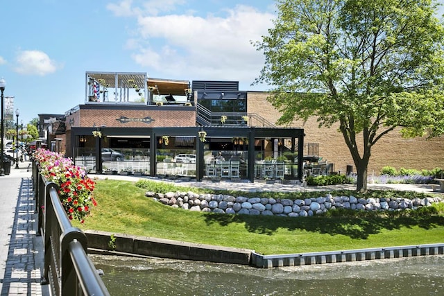 view of building exterior with a water view