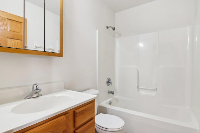 full bathroom with shower / bathtub combination, vanity, and toilet