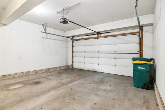 garage featuring a garage door opener