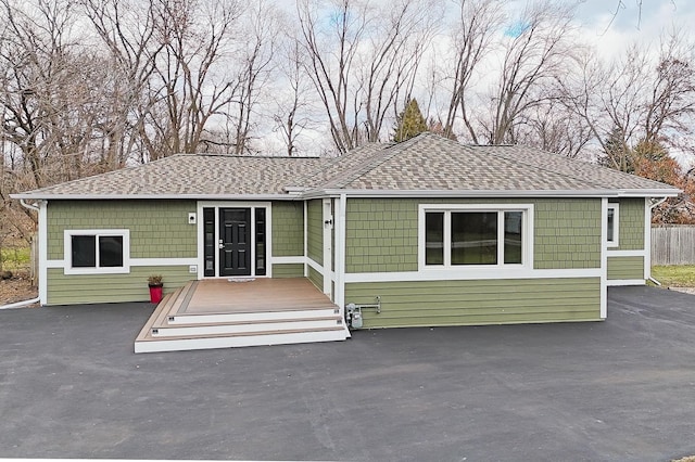 view of front of home with a wooden deck