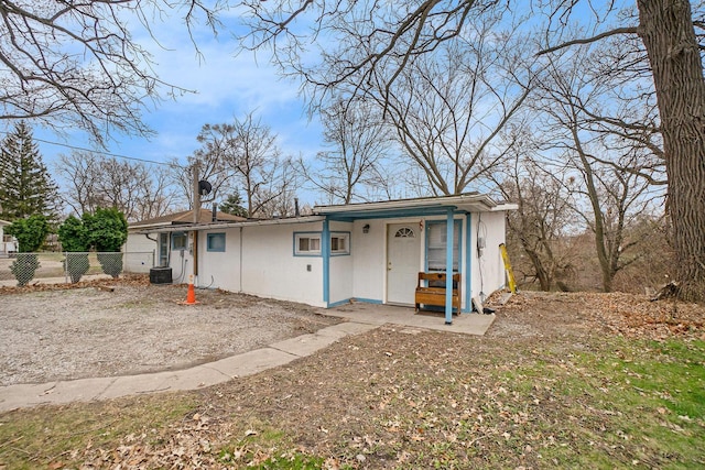 view of front of house with central AC unit