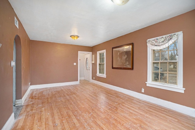 unfurnished room featuring light hardwood / wood-style flooring