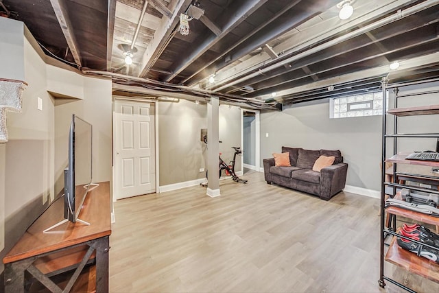 basement featuring hardwood / wood-style floors