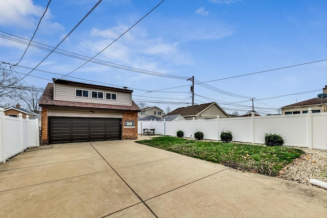 exterior space with a garage