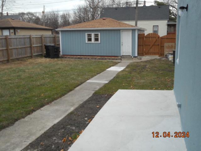 view of outdoor structure featuring a yard