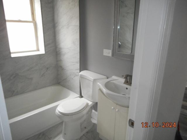 full bathroom with vanity, toilet, and shower / washtub combination