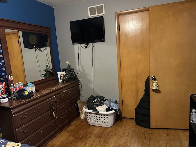 bedroom with light wood-type flooring