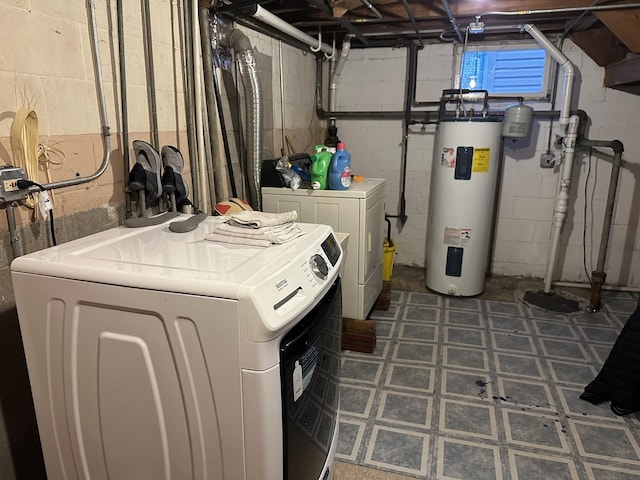 clothes washing area with independent washer and dryer and water heater