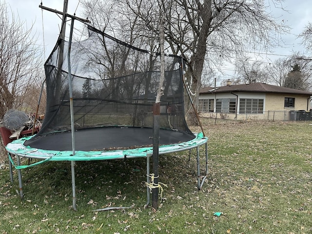 view of yard featuring a trampoline