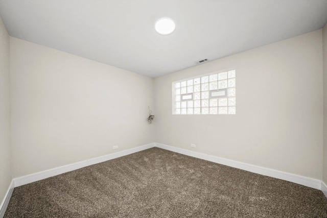 unfurnished room with carpet flooring