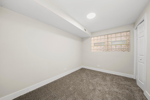 unfurnished bedroom with a closet and carpet floors