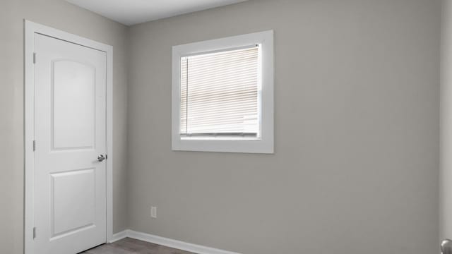 unfurnished room featuring a wealth of natural light