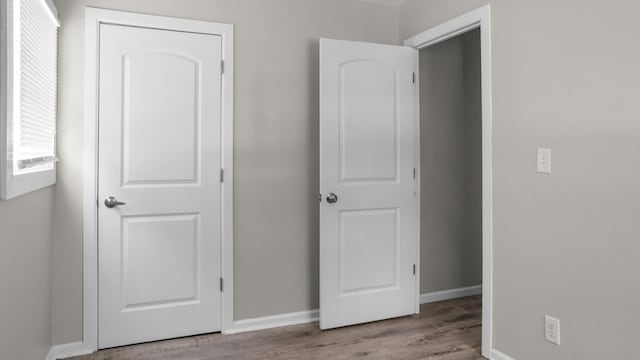 unfurnished bedroom featuring light hardwood / wood-style floors