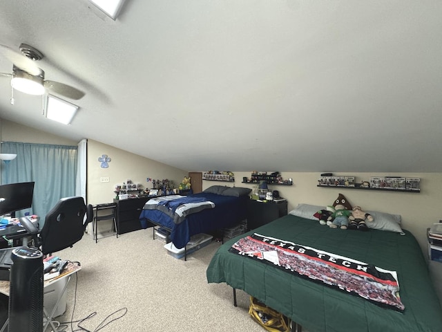 carpeted bedroom with vaulted ceiling and ceiling fan