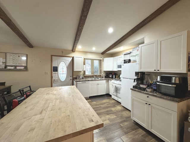 kitchen with wood counters, white appliances, sink, dark hardwood / wood-style floors, and white cabinetry