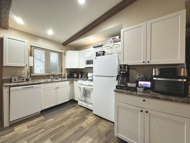 kitchen featuring white cabinetry, white appliances, sink, and dark wood-type flooring