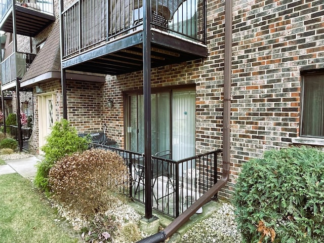 doorway to property with a balcony