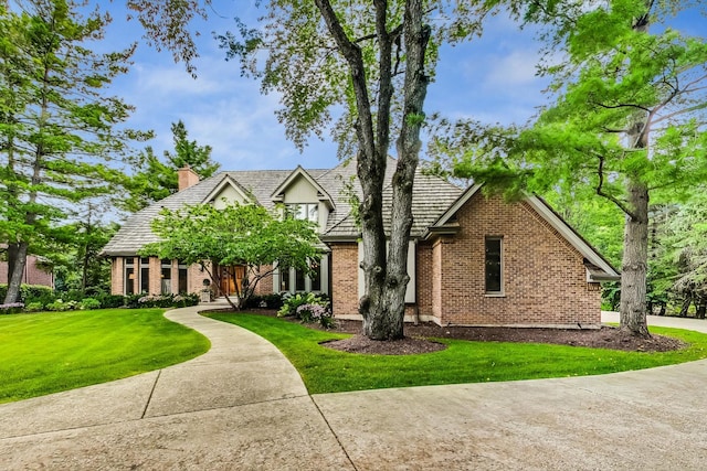 view of front of property with a front lawn