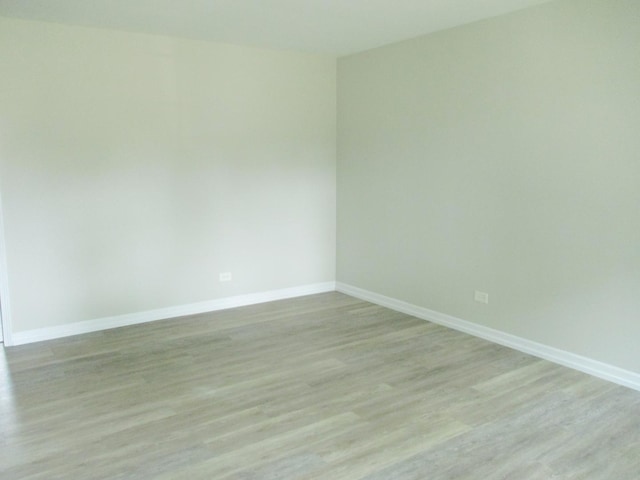 unfurnished room featuring light hardwood / wood-style flooring