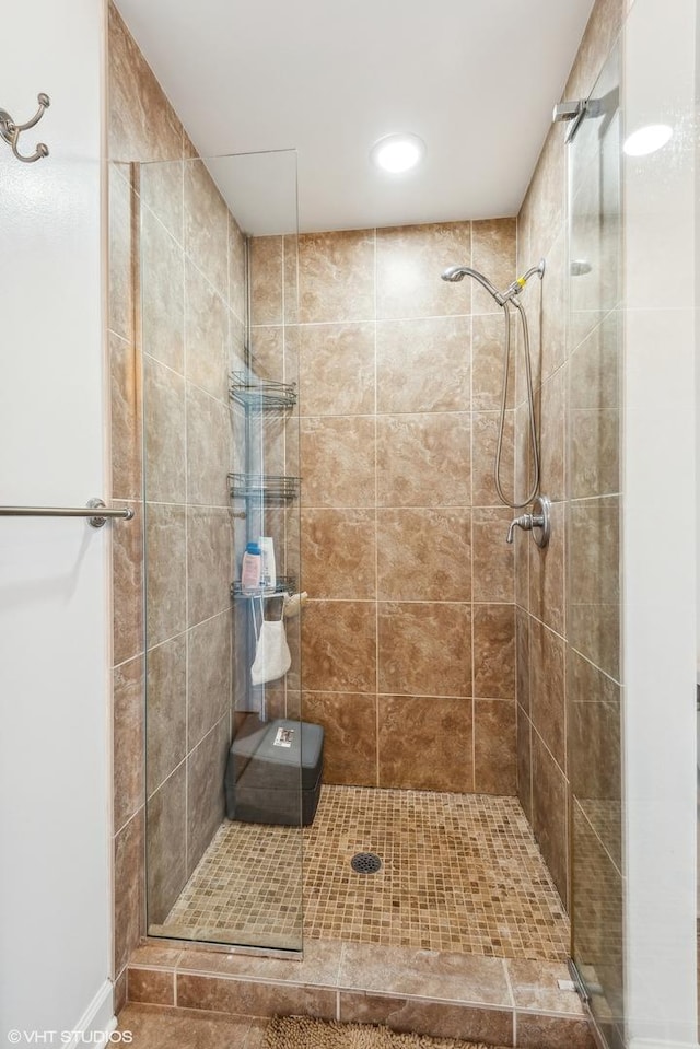 bathroom featuring an enclosed shower