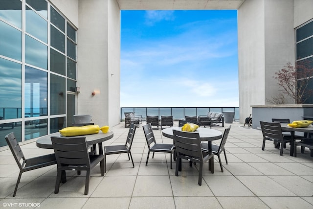 view of patio / terrace with a water view