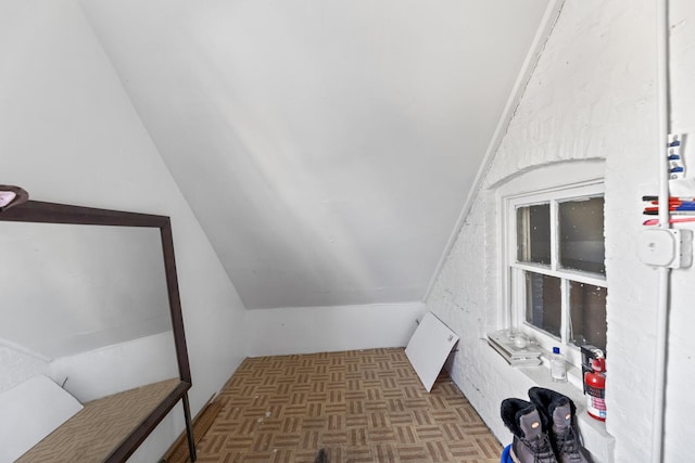 laundry room featuring dark parquet floors